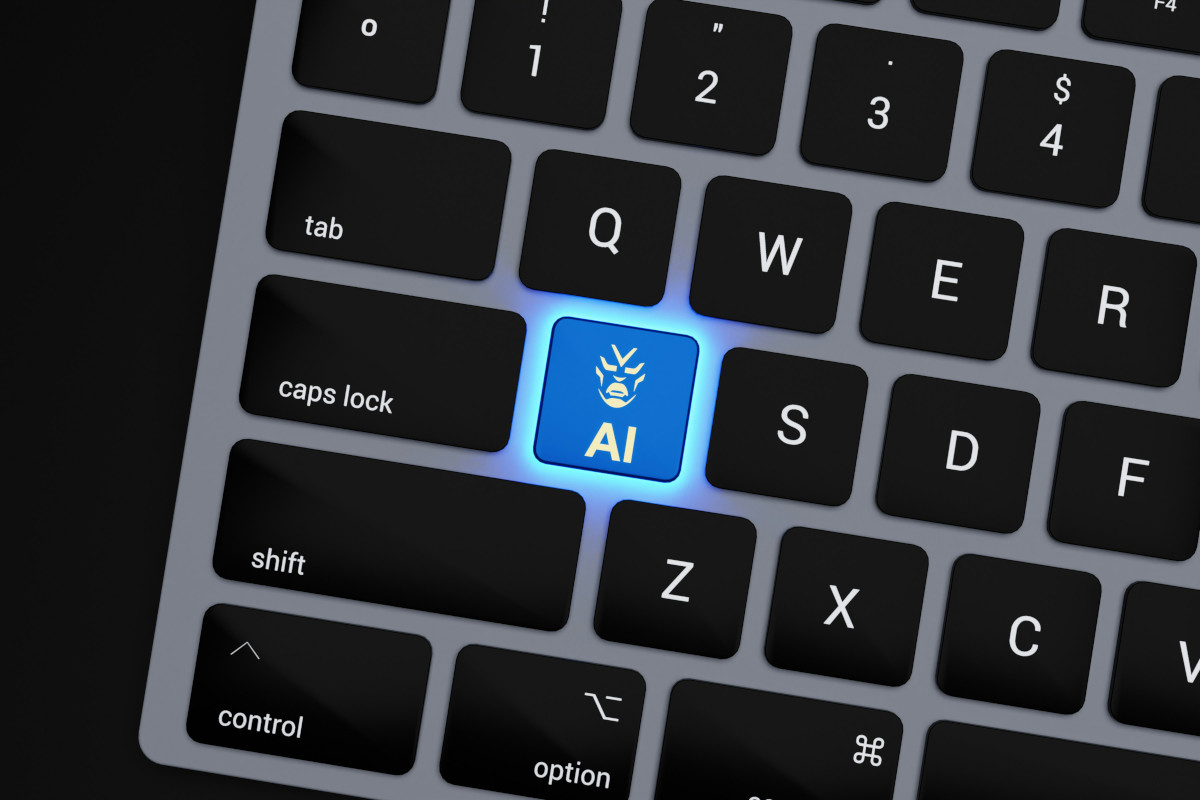 The image shows a computer keyboard with a key labelled 'AI' that is highlighted in blue, indicating that it has been selected. Surrounding the AI key are other keys in black, and the keyboard itself is set against what appears to be a dark surface. The background is out of focus, emphasizing the keyboard as the central subject of the image. The overall style of the image is a photograph with a shallow depth of field, focusing on the immediate foreground area.
