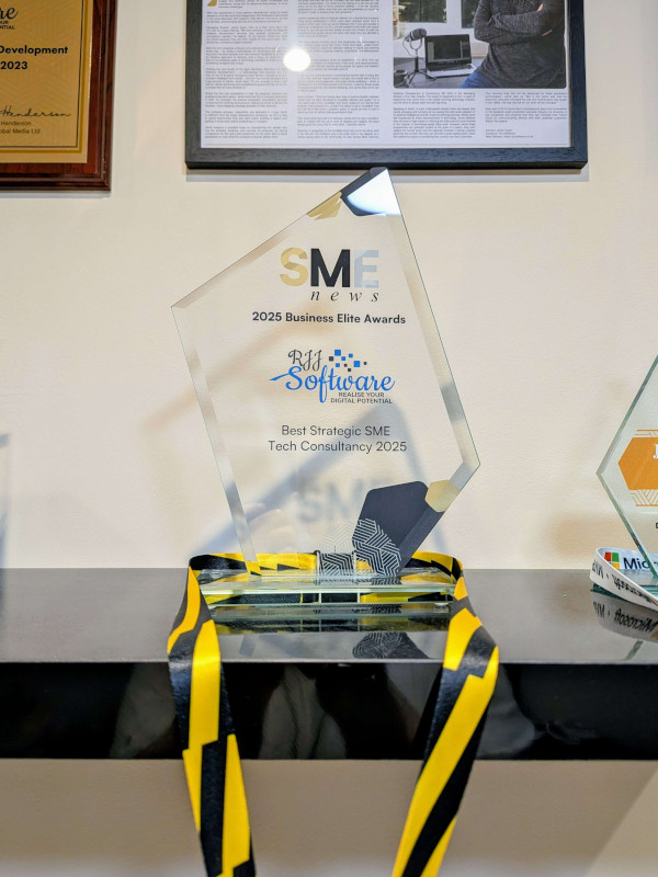 A semi-transparent award which reads ‘SME News 2025 Business Elite Awards - Best Strategic SME Tech Consultancy 2025’