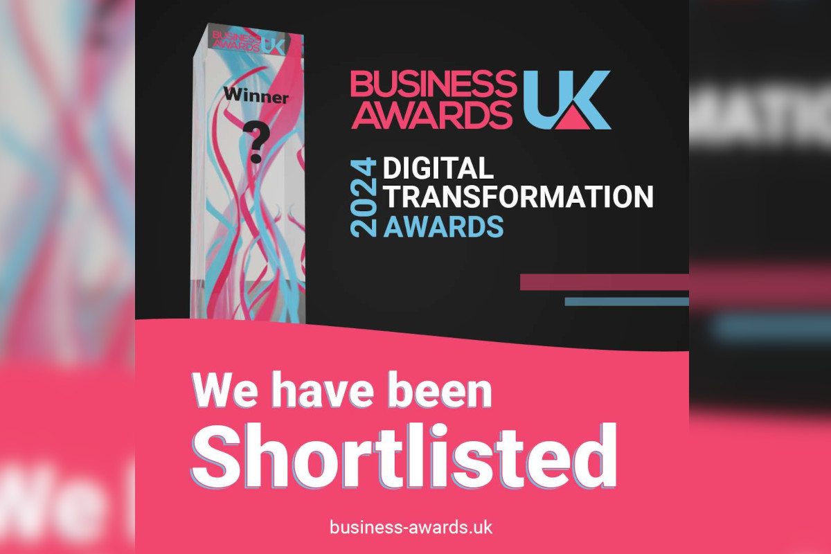 The image is a promotional graphic for an event, specifically the UK Business Awards. At the top of the poster, there's a ribbon with the text 'Winner 2014 Digital Transformation,' indicating that one company won this category in 2014. Below the ribbon, the name 'Business UK' is prominently displayed, suggesting it is the organizing body or the entity awarding the accolade. The central part of the poster features a boxed section with a certificate design. Inside this section, there's a text that reads 'We have been shortlisted.' This indicates that RJJ Software has  made it to a list of finalists for the awards, but has not yet won. The word 'shortlisted' is highlighted in bold, drawing attention to the achievement. The poster has a clean and professional design with a color scheme predominantly featuring shades of pink and blue.