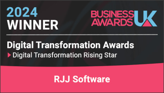 The image is a digital announcement. On the left side, there's text that reads '2024' in large white font on a black background. Below this, the text 'BUSINESS AWARDS UK' is displayed in smaller white font against a pink gradient background.
In the center of the image, there is a graphic with the words 'Digital Transformation Awards' in bold white letters on a transparent background, giving it a floating effect. The word 'Awards' is emphasised and appears to be part of a logo or emblem.
To the right, there's an image of a digital badge that says 'RJJ Software' in lowercase white letters on a black background, indicating the name of a company or software solution associated with the award.
On the bottom left corner, there is a graphic that resembles a digital trophy with the words 'Digital Transformation Awards UK' printed across it. The text is in a gradient effect that transitions from white to pink and black, creating an attractive and modern look.
In the lower right corner of the image, there's a pink badge with white text that says 'RJJ Software' and below it, a tagline or description that reads 'Digital Transformation Rising Star.' This suggests that RJJ Software has been recognised for its contributions to digital transformation within the UK.